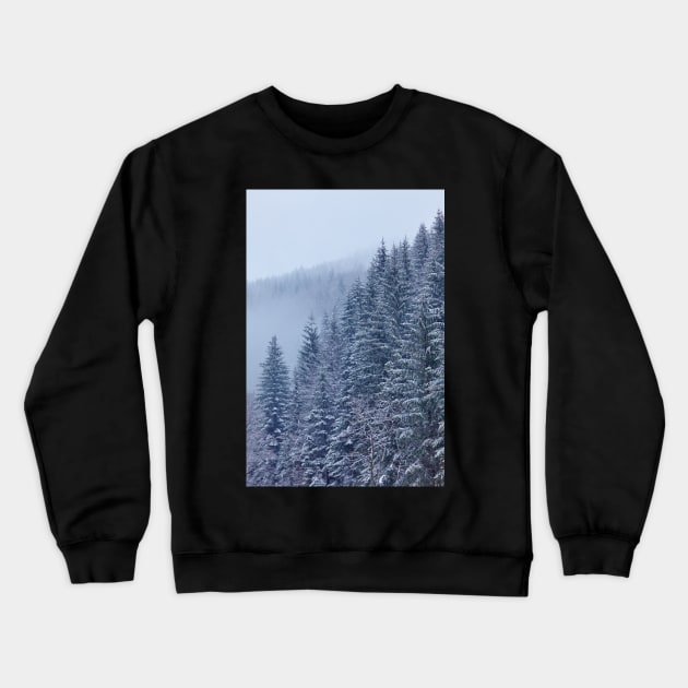 Snow-covered fir forest Crewneck Sweatshirt by naturalis